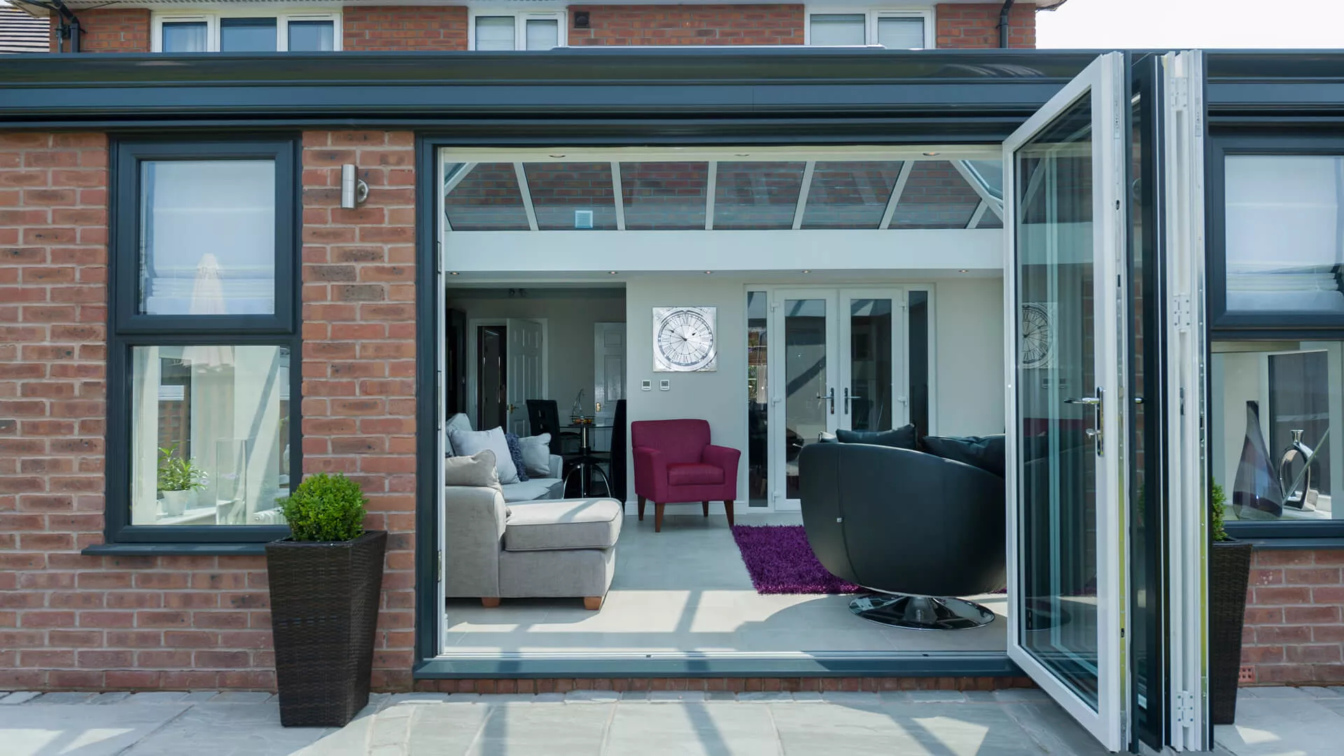 Modern Grey Orangery with Bi-Fold Doors